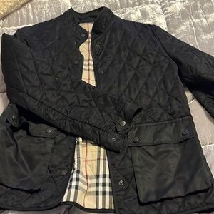 Vintage black Burberry women’s jacket in size medium